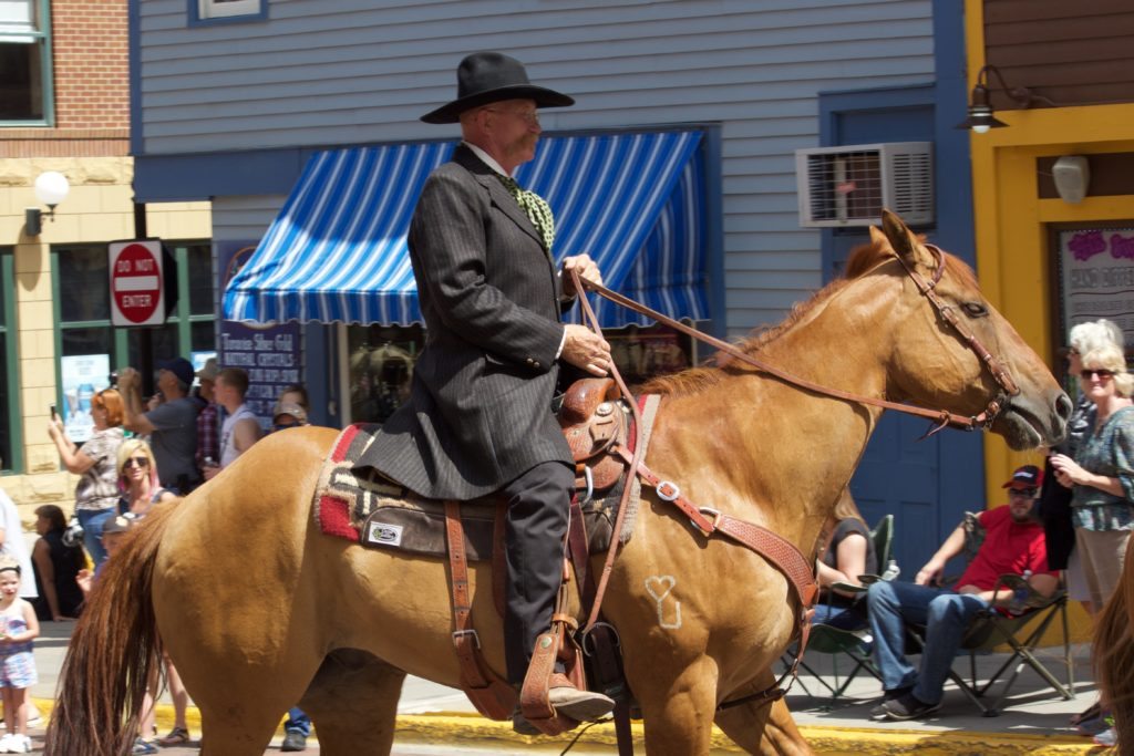 Paul Larson of Cowboy Country Music in Deadwood parade