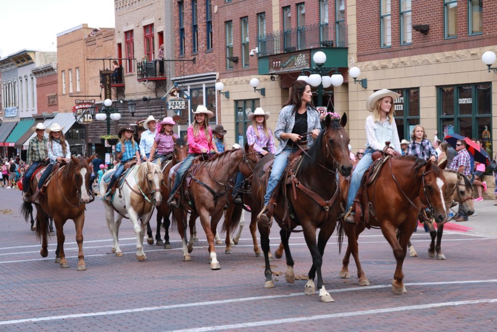 cowgirls in the parade