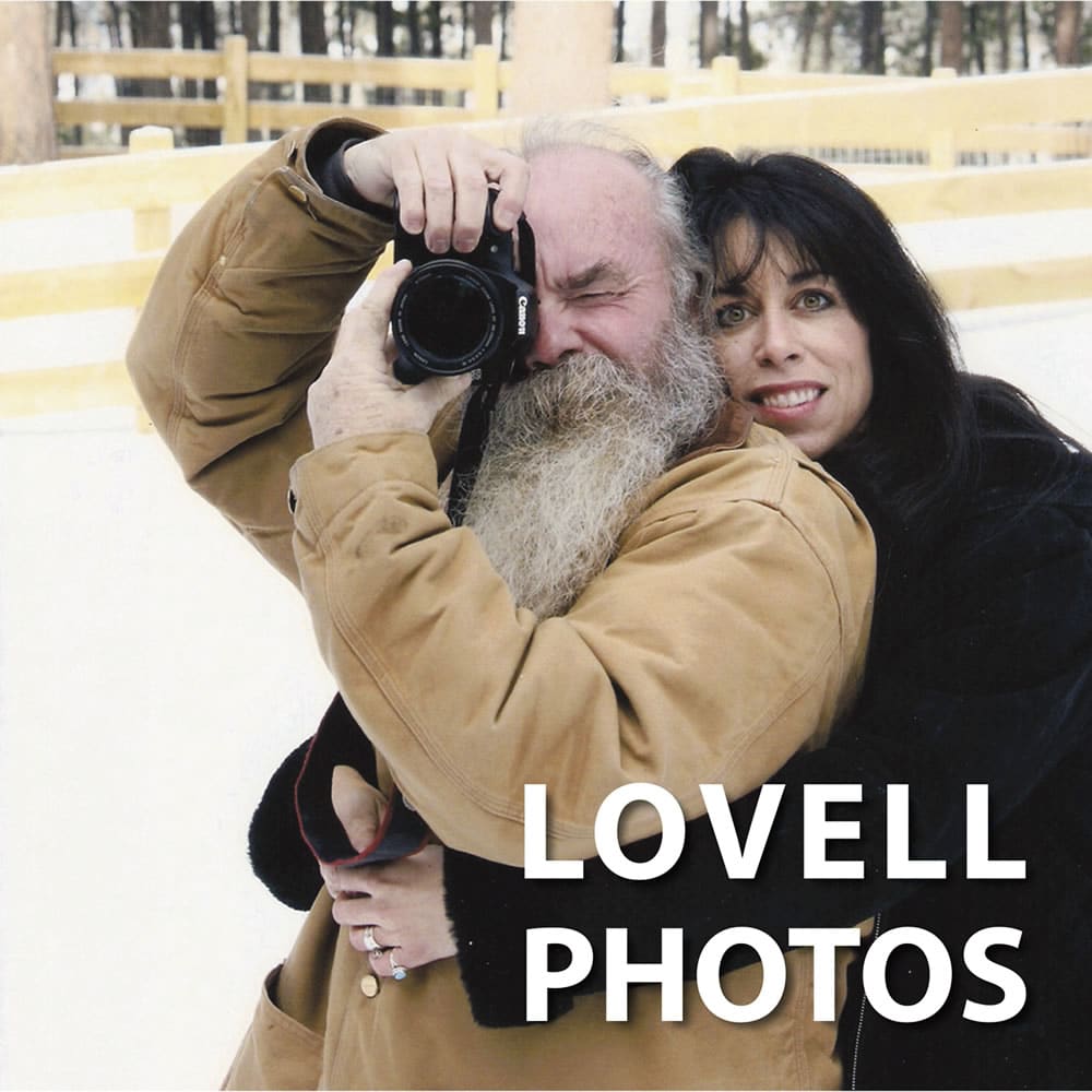 buck and traci lovell hugging outside with a camera in hand