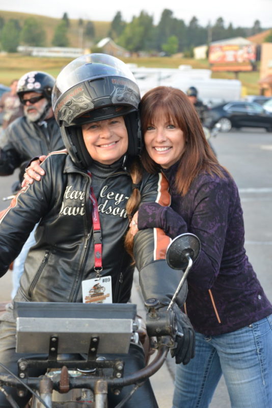 cris simmons and sharon jacobs at the starting line of the motorcycle cannonball