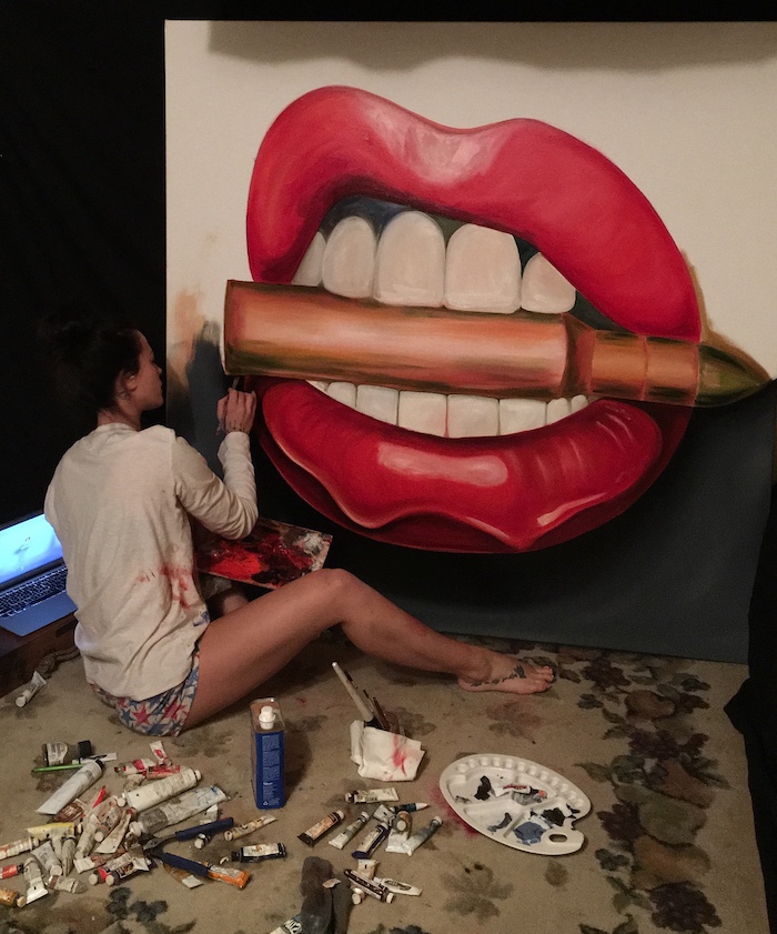 Alexa Jacobs creating her bullet and lips painting called Bite Me