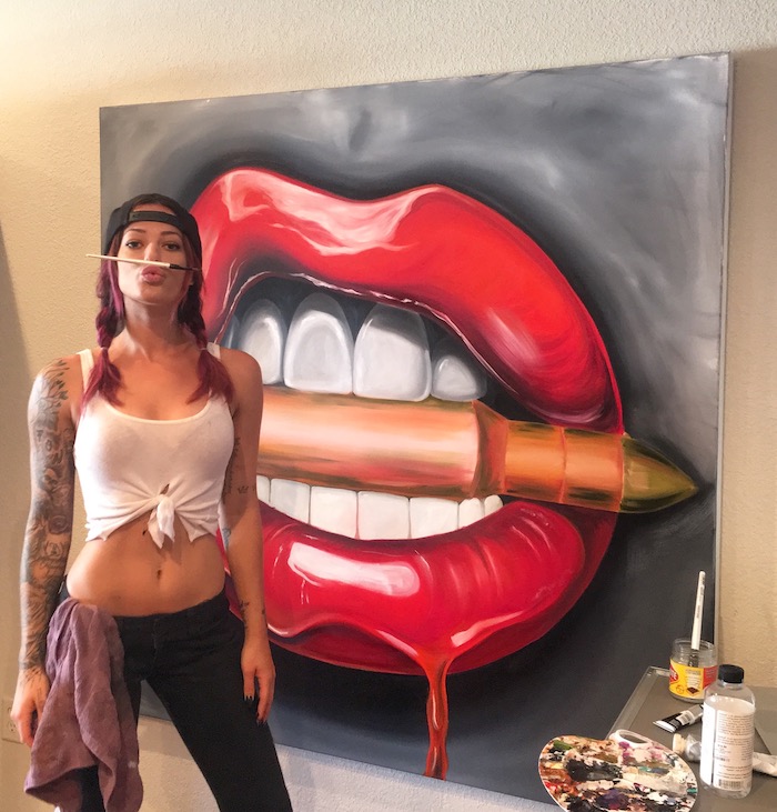 Alexa Jacobs playing around with her bullet and lips painting called Bite Me