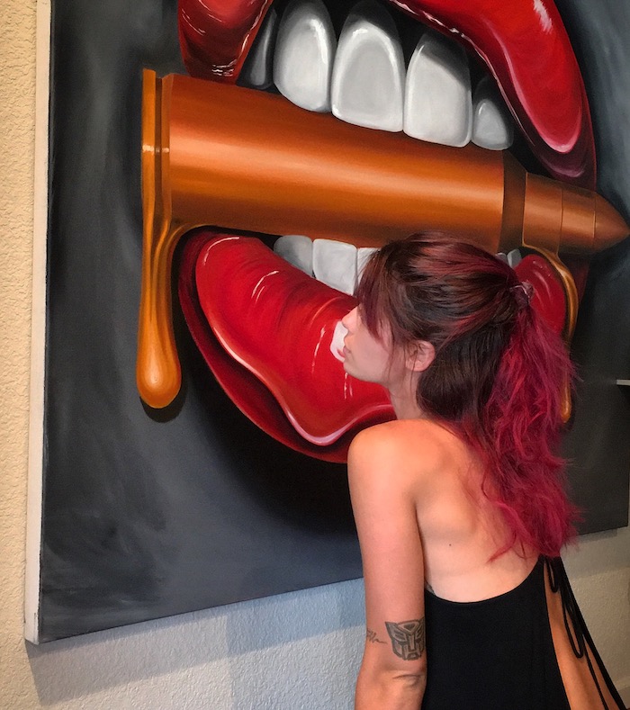 Alexa Jacobs dreading the drop on her bullet and lips painting called Bite Me