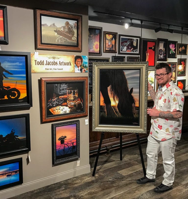 Todd Jacobs with his newest horse painting, Benjamin