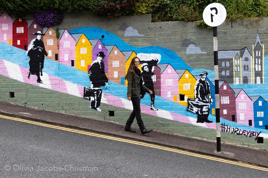 Olivia Jacobs-Chrisman at a graffiti wall in Cobh Ireland