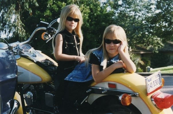 Alexa and Olivia Jacobs as biker kids in the 90s
