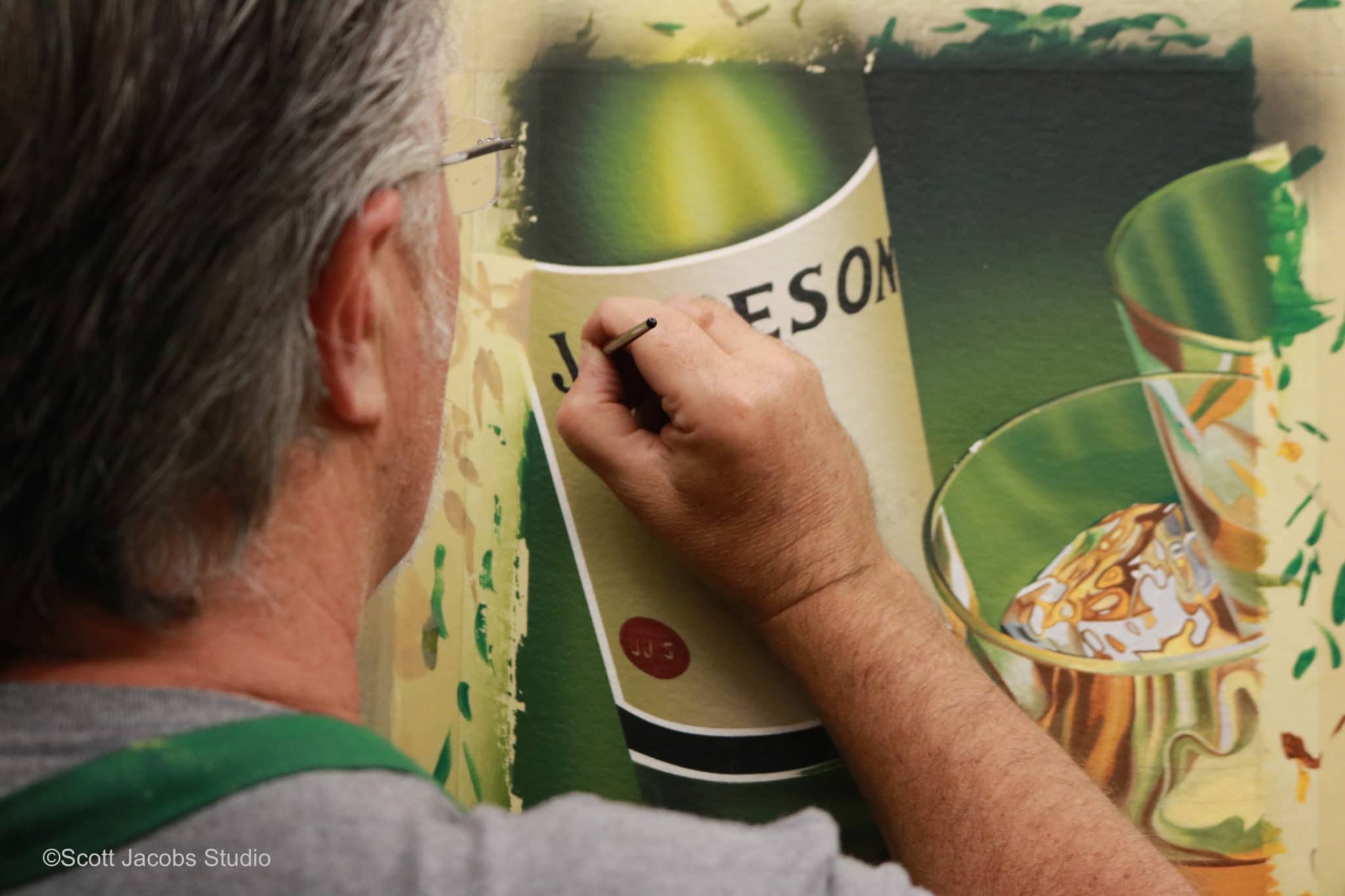 artist scott jacobs working on his Jameson whiskey painting