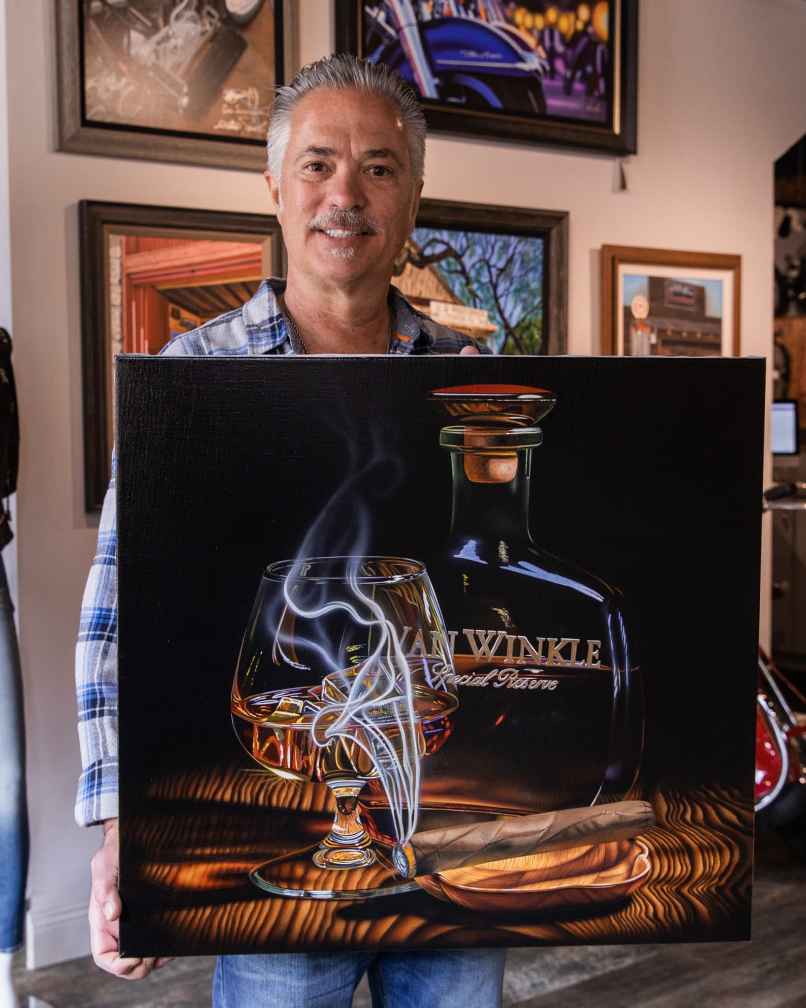 scott jacobs with his completed Pappy Van Winkle painting