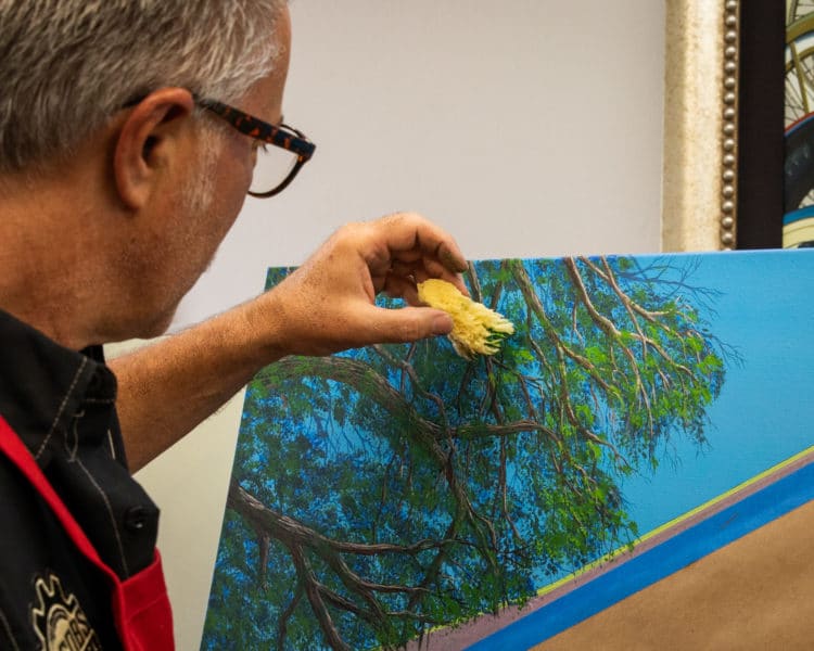 sponge painting a tree in Scott Jacobs' new 2021 sturgis rally painting