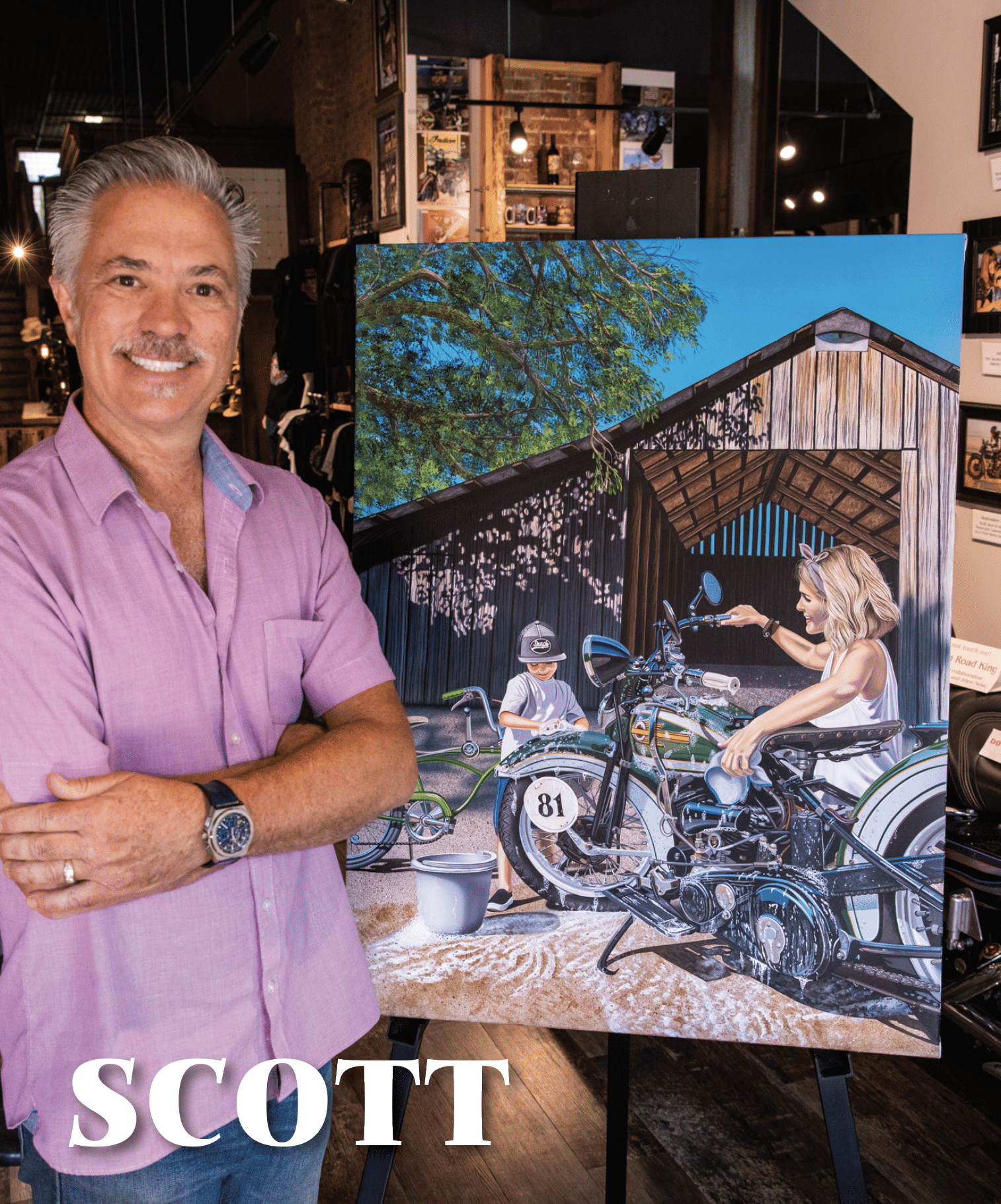 artist Scott jacobs standing with his Sturgis motorcycle painting, Moments Like These