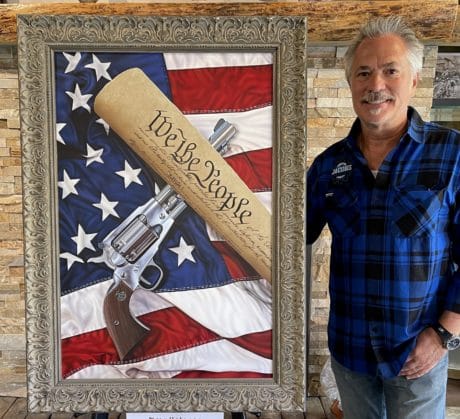 scott with "we the people" painting by scott jacobs of the us constitution, revolver and american flag
