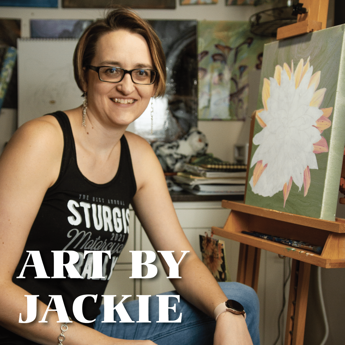 photo of artist jackie rinehart at her easel
