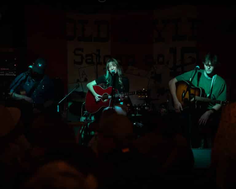 johnson singing at the songwriters festival in deadwood