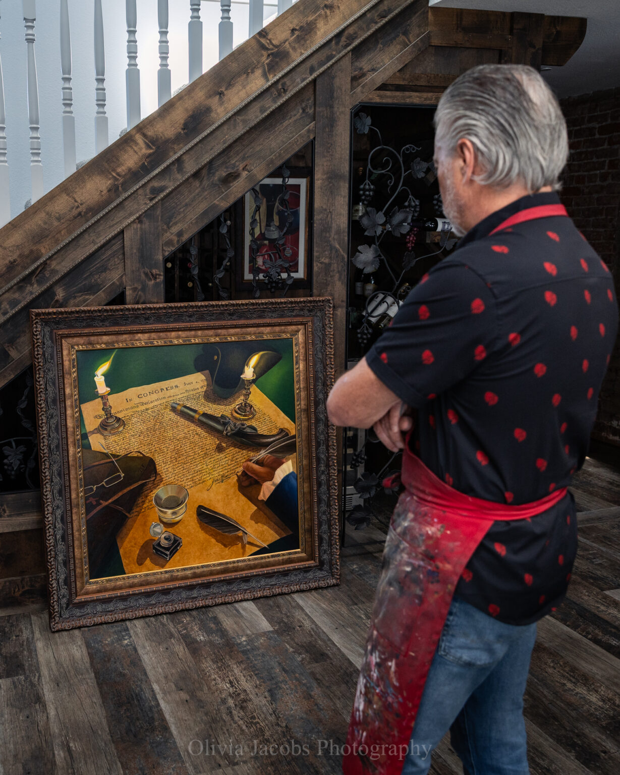 Scott reviewing his 250th anniversary painting "the moment of freedom"