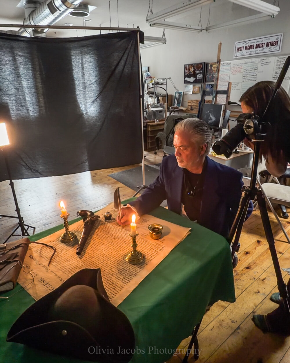 Scott Jacobs and Olivia jacobs photographing the 250th anniversary painting for the USA